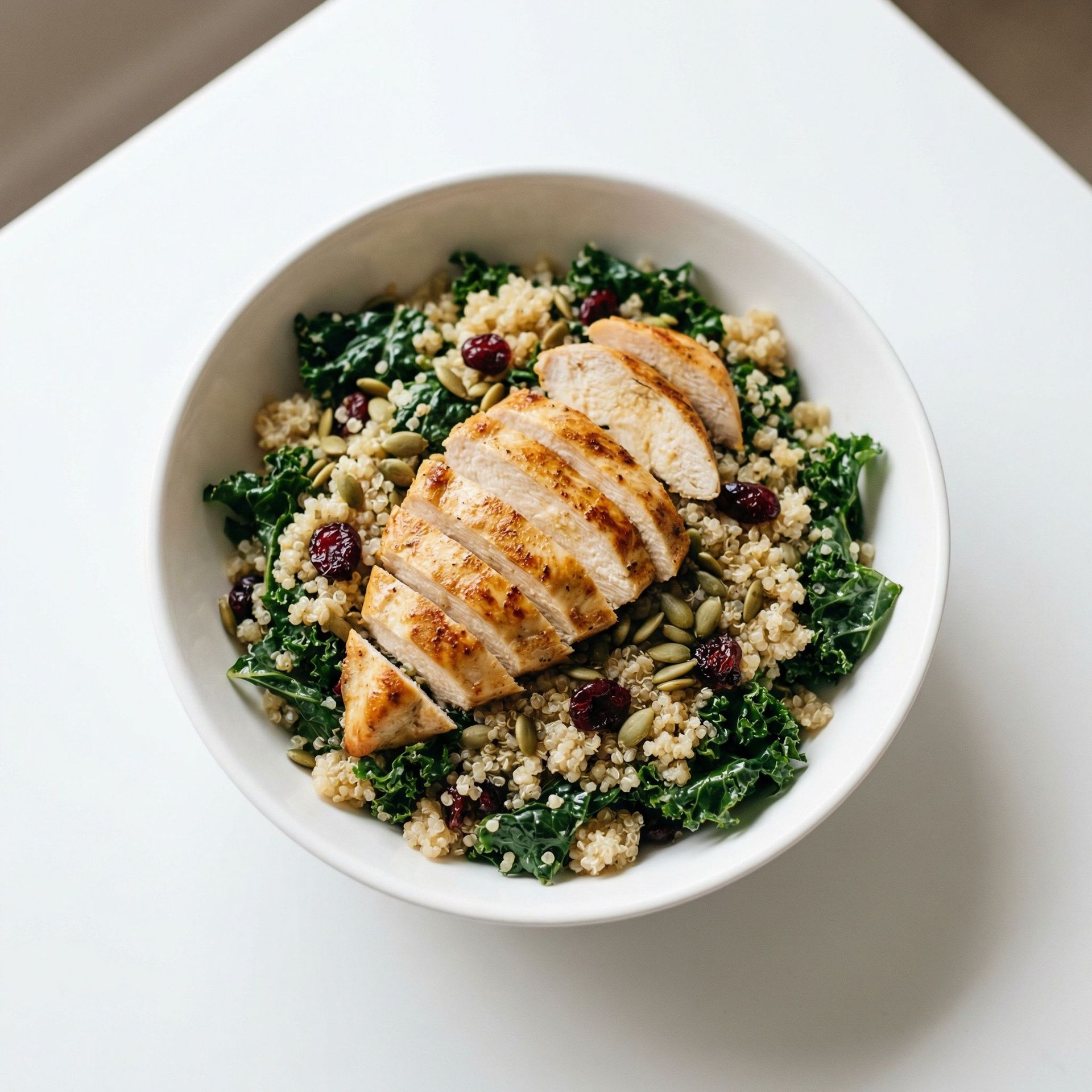 Energizing Chicken & Kale Quinoa Salad, prepared as a finished Lila recipe