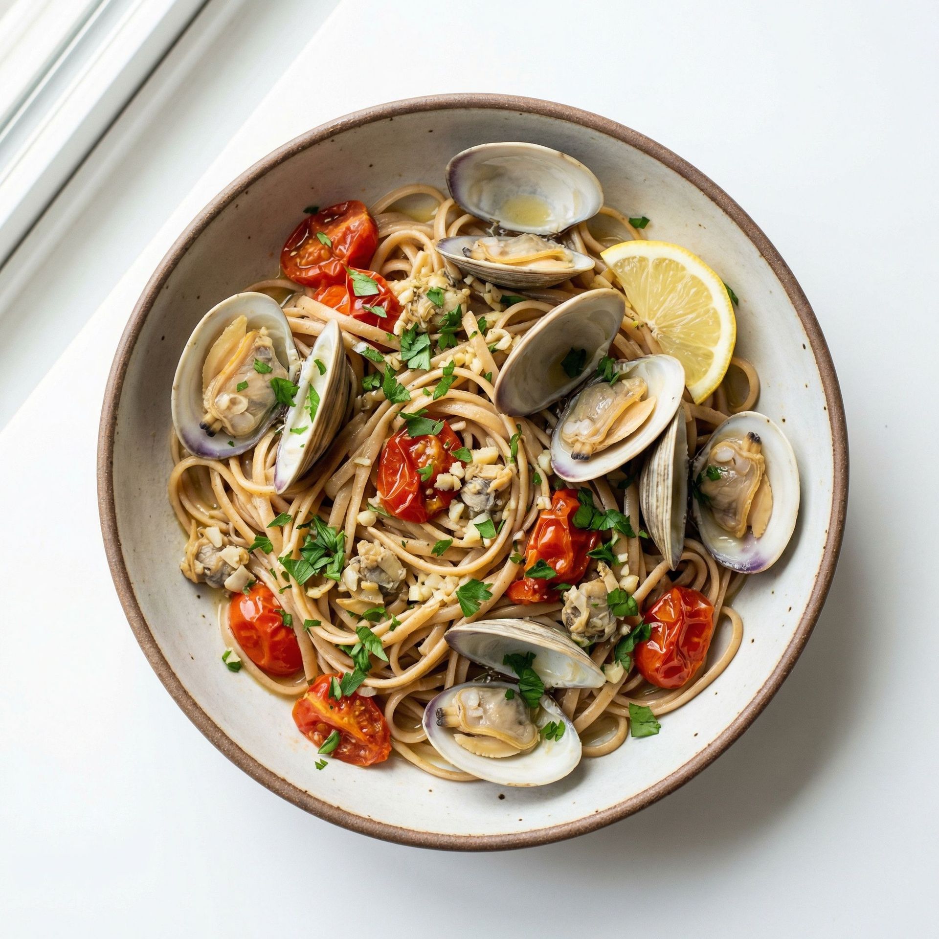 Linguine with Clams & Blistered Tomatoes, prepared as a finished Lila recipe