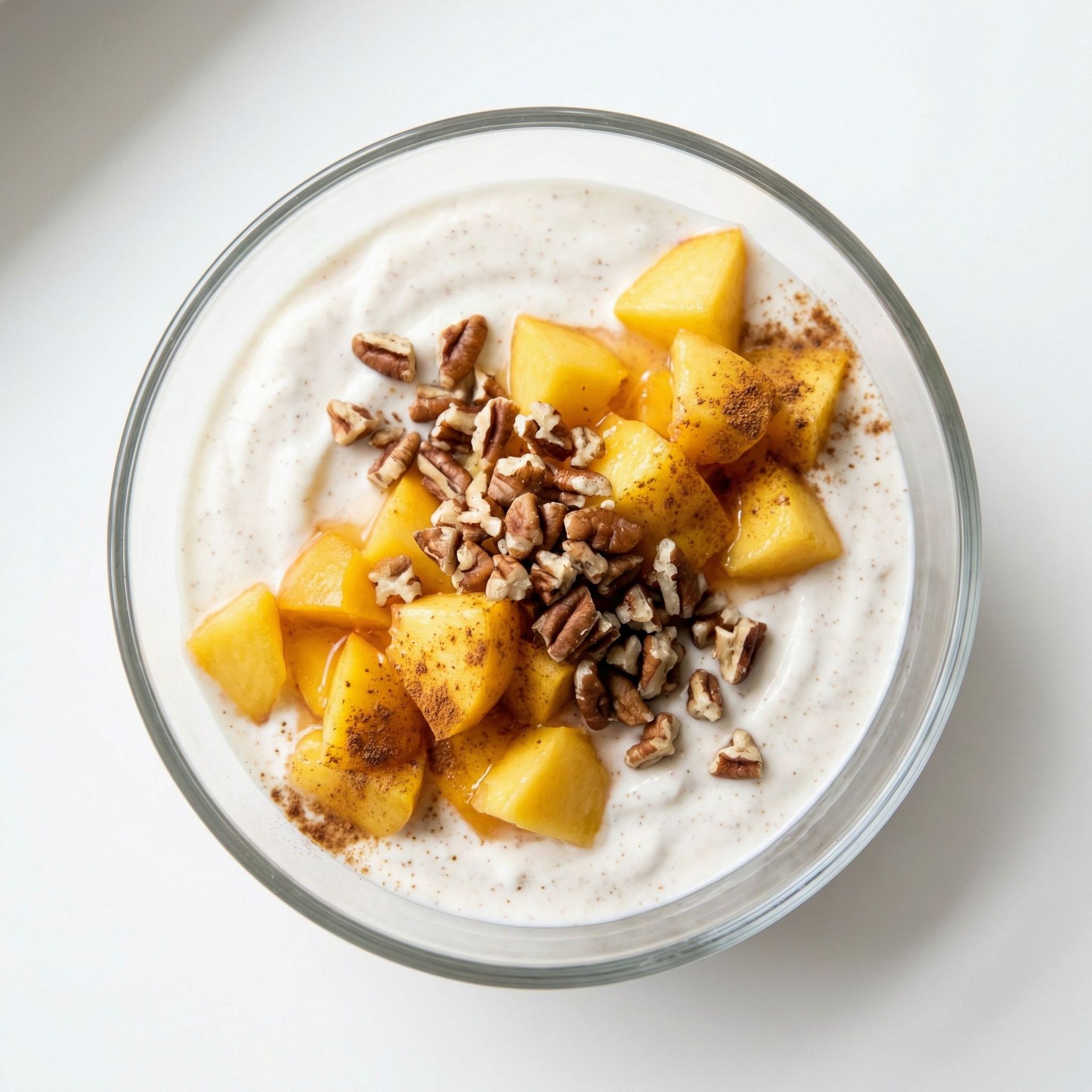 Peach and Pecan Probiotic Yogurt Bowl, prepared as a finished Lila recipe