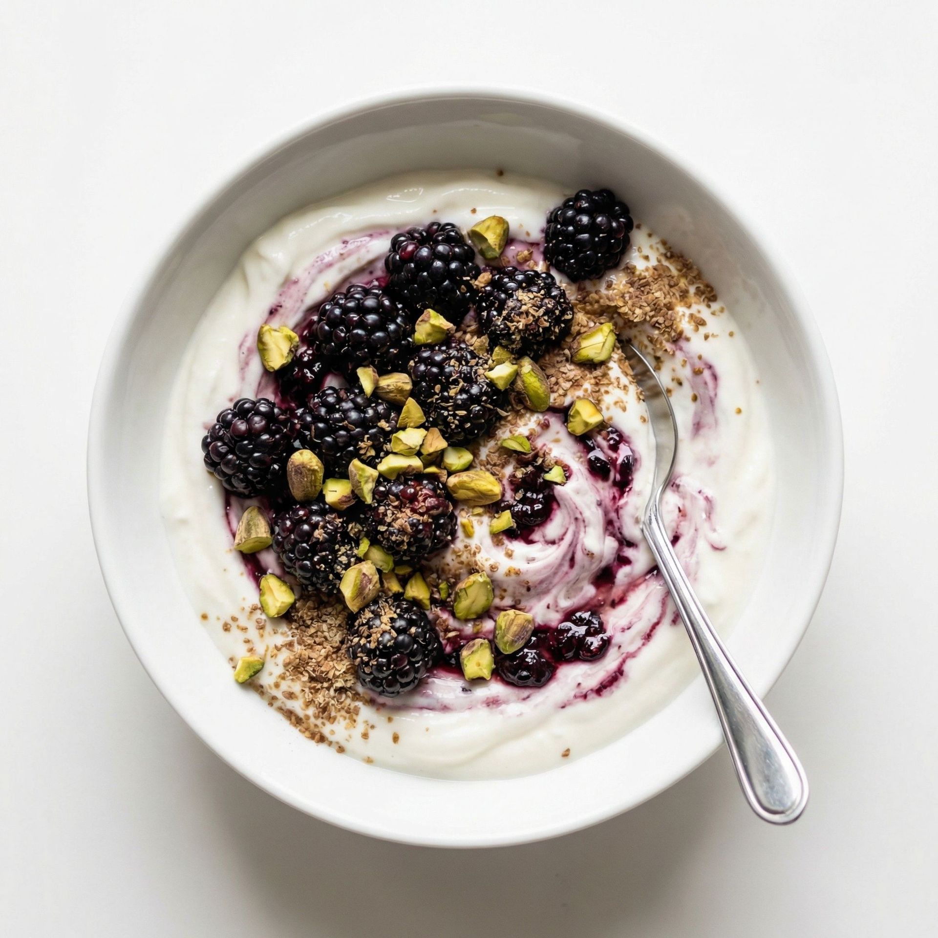 Blackberry Pistachio Greek Yogurt Bowl, prepared as a finished Lila recipe