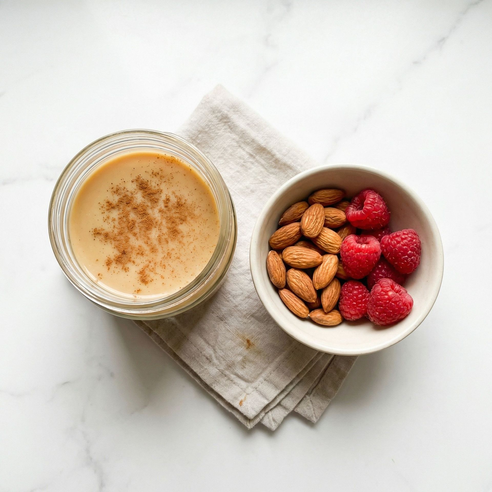 Spiced Soy Milk With Almonds & Raspberries, prepared as a finished Lila recipe